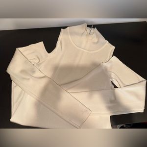 White house black market turtle neck with shoulder cut outs